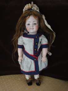 Beautiful antique German character doll with open-closed mouth, the very rare mold number 185 made by Kestner.