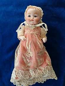 Antique doll baby with closed mouth and small blue glass eyes, Theodor Recknagel, made about 1920.