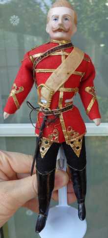 Antique doll, rare doll officer with original antique uniform and sword, dated about 1900.