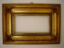 Antique gilded frame, with ornaments, made about 1830/40.