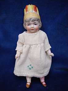 Antike Puppe aus Biskuitporzellan, um 1910.